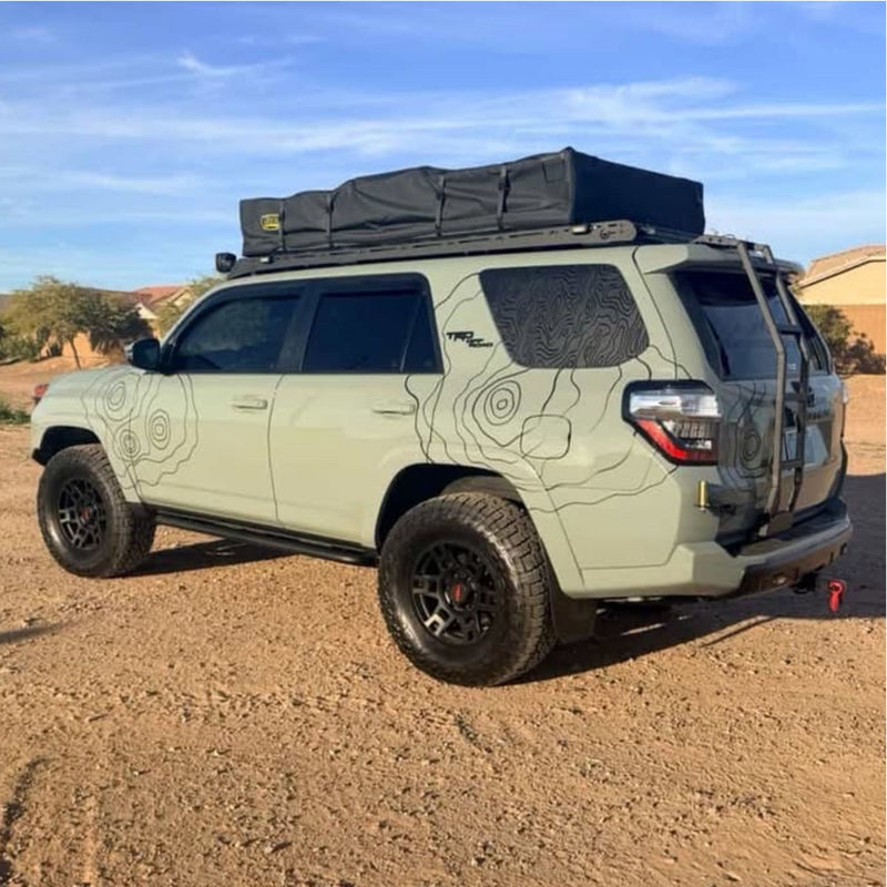 Light green Toyota 4Runner with black topo vinyl wrap